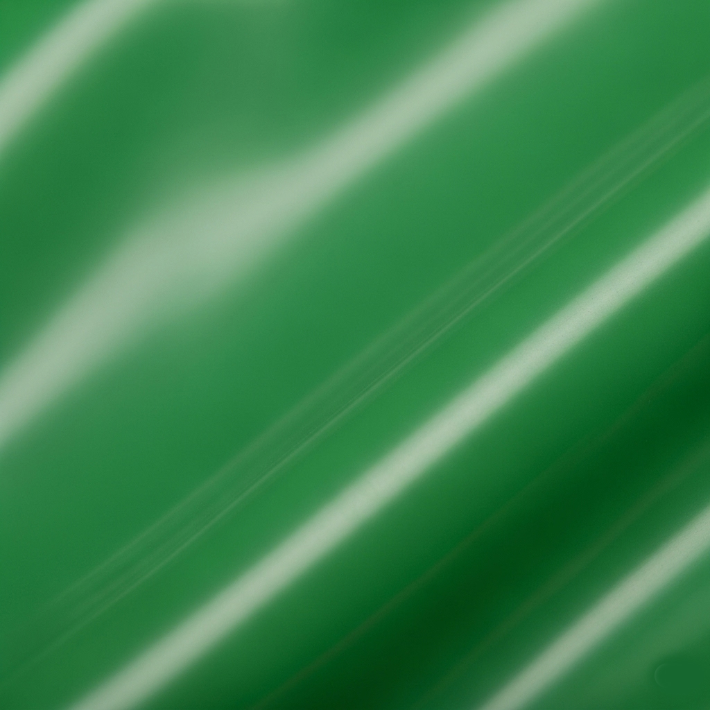 Gros plan sur la texture du tissu en latex médical vert.